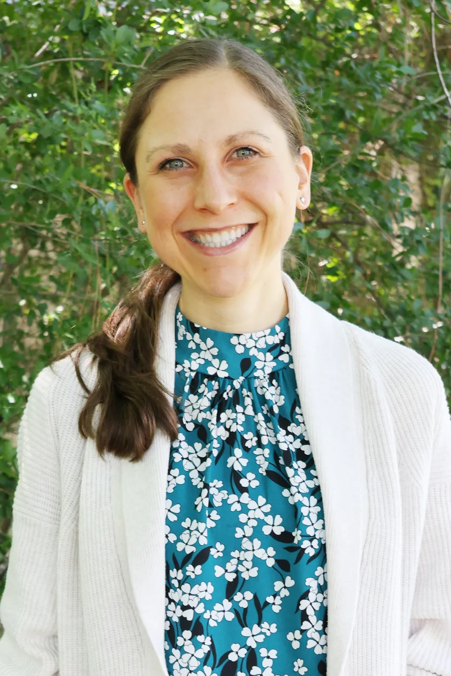 Headshot of Jillian Rigert, LMFT-Associate at Happy Camper Therapy